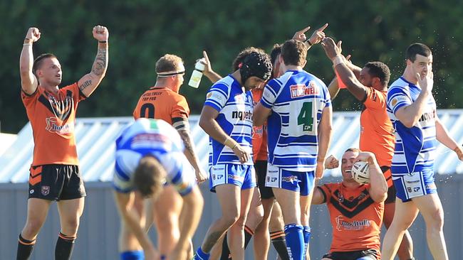 Tully players celebrate their win over Brothers in the 2018 CDRL preliminary final at Barlow Park. The two clubs are set to return to the field, alongside the Northern Pride, for a unique series next month. PICTURE: JUSTIN BRIERTY