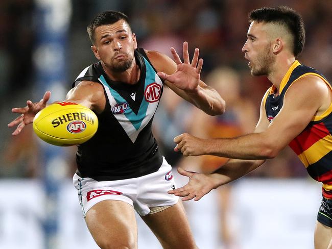 Ryan Burton (L) may be forced to play tall if Aliir Aliir is not ready to play. Picture: Sarah Reed/AFL Photos via Getty Images