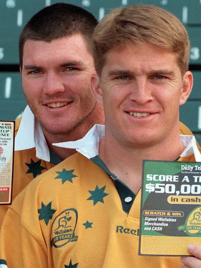 Dan Herbert (left) and Tim Horan during their Wallabies playing days. Picture: File