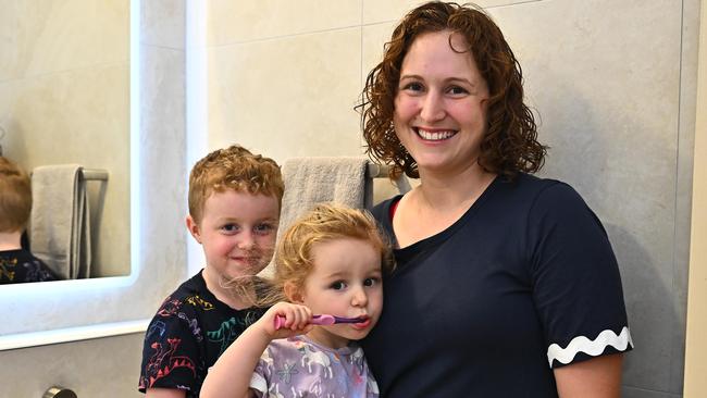 Cairns kids Hamish and Astrid Thorpe, with their mum Laura, brush their teeth twice a day. Picture Emily Barker.