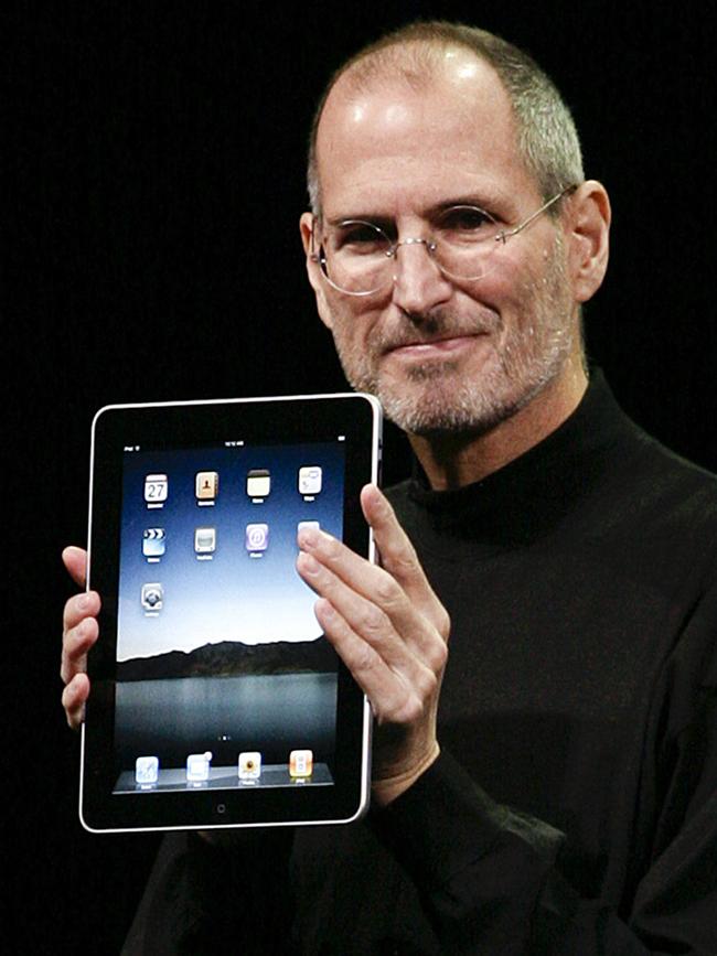 Turning in his grave … Steve Jobs unveils the iPad in 2010. Picture: AFP/Ryan Anson