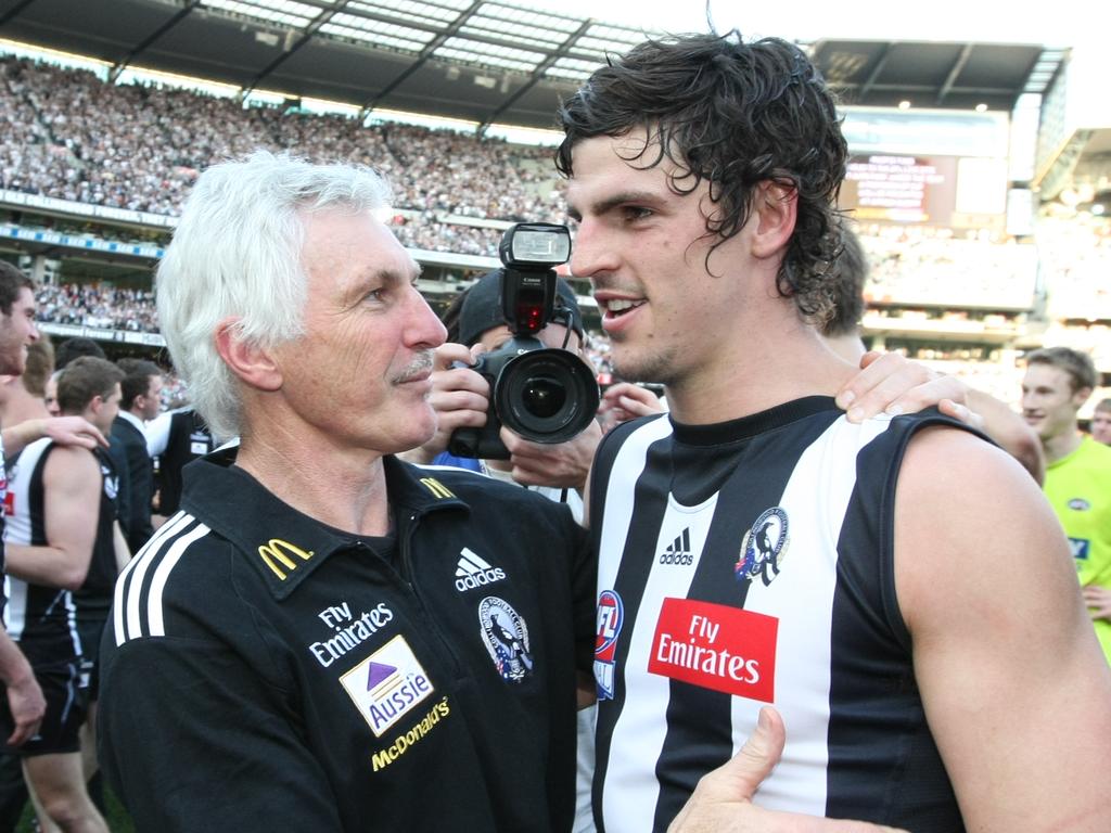 Mick Malthouse and Scott Pendlebury after the 2010 premiership.