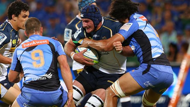 PERTH, AUSTRALIA - MARCH 01: Ben Mowen of the Brumbies gets tackled by Sam Wykes of the Force during the round three Super Rugby match between the Western Force and the ACT Brumbies at nib Stadium on March 1, 2014 in Perth, Australia. (Photo by Paul Kane/Getty Images)