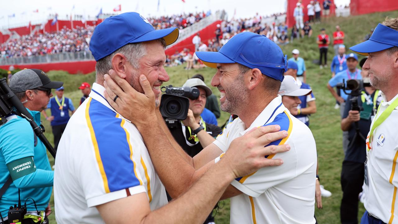 Lee Westwood of England and team Europe and Sergio Garcia of Spain and team Europe greet each other following Sunday Singles Matches of the 43rd Ryder Cup at Whistling Straits on September 26, 2021 in Kohler, Wisconsin. Photo: Getty Images