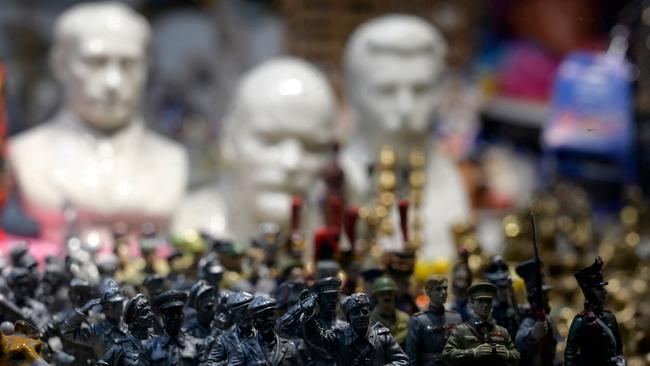 Busts of Russian President Vladimir Putin, Soviet Union founder Vladimir Lenin and Soviet dictator Joseph Stalin. Picture: AFP