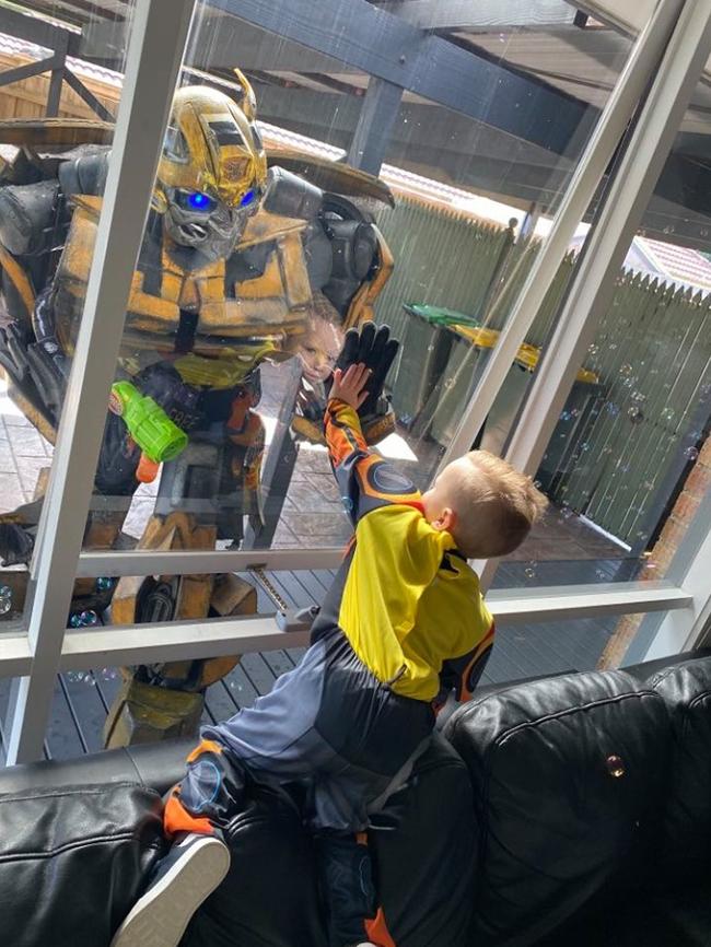 Hunter meeting Bumblebee on his fourth birthday.