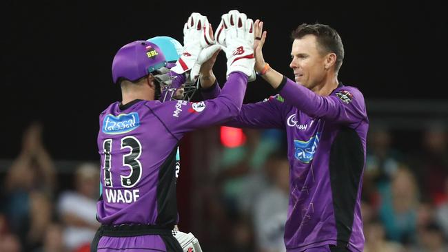 Johan Botha, right, celebrates a wicket with keeper and captain Matthew Wade during the match against the Brisbane Heat last month. Picture: GETTY