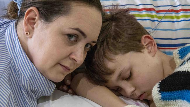 August 15, 2024: Simone Suggate with Fraser at the WomenÃs and ChildrenÃs Hospital. Nine-year-old Fraser Suggate is an incredible basketball player, he loves his family and he has a brain tumour heÃs named ÃBob the BlobÃ.  Picture: Kelly Barnes