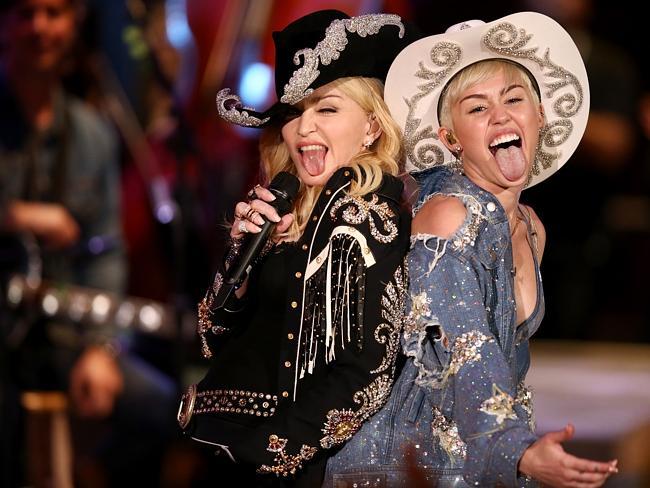 Madonna and Miley Cyrus perform onstage during Miley Cyrus: MTV Unplugged at Sunset Gower Studios on January 28, 2014 in Hollywood, California. Picture: Getty