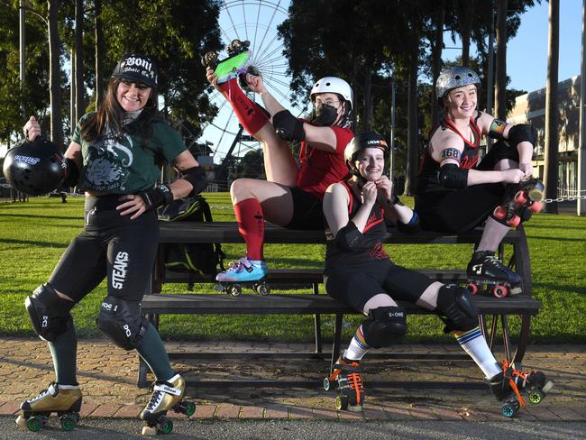 Adelaide Roller Derby stars Didi “Trinket” Whitford, Rae “Bone Shaker” Darcy, Alex “Rage Ruthless” Knopoff and Cassandra “Foris O-pal” Townsend at the Adelaide Show Grounds. Picture: Tricia Watkinson