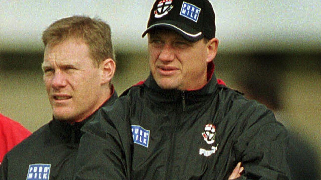 7/8/2001. Robert Harvey, Nathan Burke and Grant Thomas at St Kilda training.