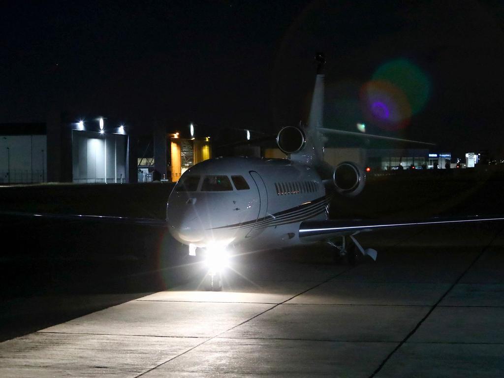 The jet carrying Shane Warne arrived in Melbourne shortly after 8.30pm. Picture: AFP