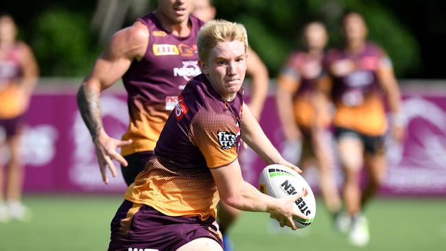 Rising broncos halfback Tom Dearden looks to pass during a Brisbane training session. Picture: Bradley Kanaris