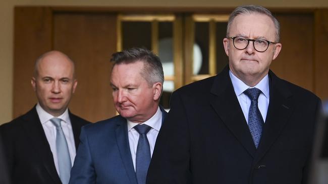 From right: Anthony Albanese and Energy Minister Chris Bowen lead out former NSW Liberal treasurer Matt Kean at a news conference on Monday. Picture: NewsWire / Martin Ollman