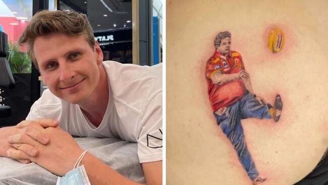 Daniel Gorringe now has a tattoo of Gold Coast Suns coach Stuart Dew on his backside.