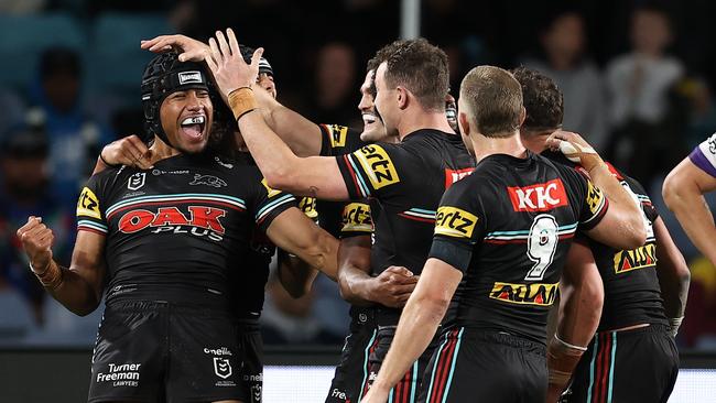 SYDNEY, AUSTRALIA - SEPTEMBER 22:  Stephen Crichton of the Panthers celebrates with Dylan Edwards of the Panthers after scoring a try during the NRL Preliminary Final match between the Penrith Panthers and Melbourne Storm at Accor Stadium on September 22, 2023 in Sydney, Australia. (Photo by Brendon Thorne/Getty Images)