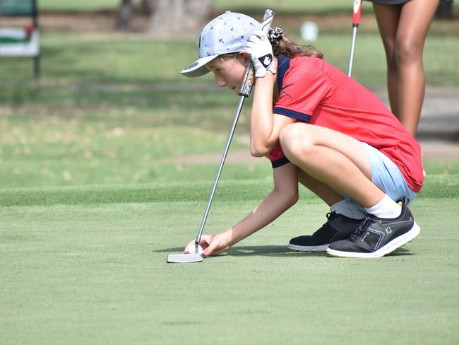 Laidley's Skyla Taylor (girls 11-12 years) lines up a putt at the US Kids Golf Foundation Australian Open at the Rockhampton Golf Club on September 28.