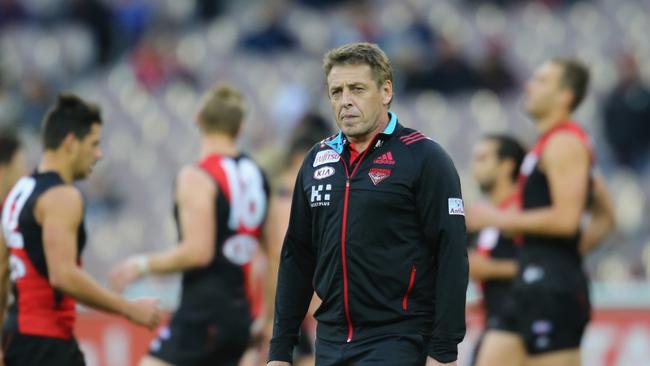 MELBOURNE, AUSTRALIA - JUNE 15:  Bombers head coach Mark Thompson looks on during the round 13 AFL match between the Essendon Bombers and the Melbourne Demons at the Melbourne Cricket Ground on June 15, 2014 in Melbourne, Australia.  (Photo by Scott Barbour/Getty Images)