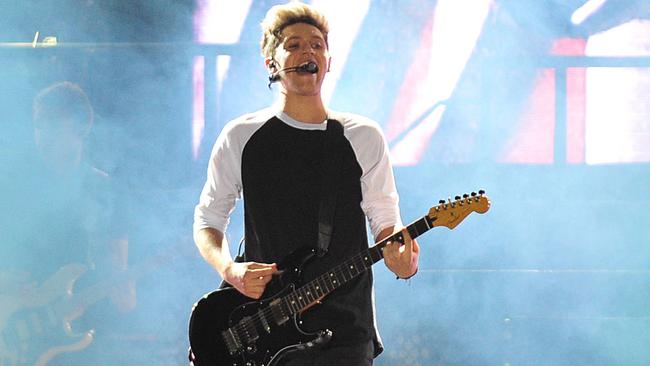 British Group One Direction perform in concert in Santiago, on April 30, 2014. AFP PHOTO/ FRANCESCO DEGASPERI