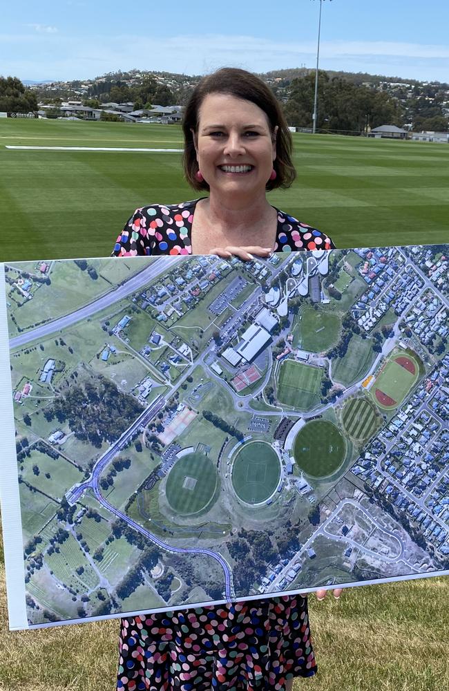 Kingborough Mayor Paula Wriedt with an aerial view of an expanded Twin Ovals precinct to accommodate an AFL High Performance Centre. Picture James Bresnehan.jpg