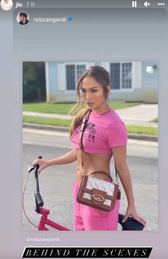 She wore a matching pink Coach crop and trackies, styled with an over-the-shoulder bag and heels. Picture: Instagram/JLo