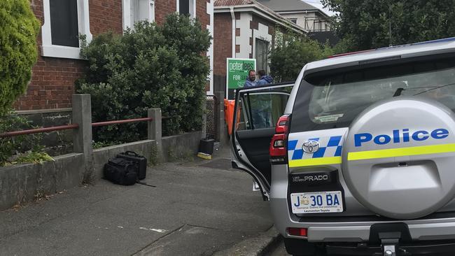 Tasmania Police at the scene of a Ms Zhang’s death in Wellington Street, Launceston. Picture: Helen Kempton