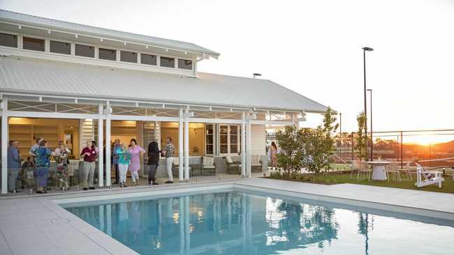 Guests of Pradella Property Ventures inspect the new summer house at the upcoming $71 million Seachange retirement in Harristown. Picture: DK Photography