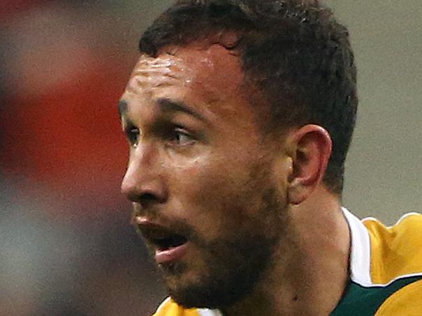 PARIS, FRANCE - NOVEMBER 15: Quade Cooper of Australia in action during the International match between France and Australia at The Stade De France on November 15, 2014 in Paris, France. (Photo by Charlie Crowhurst/Getty Images)