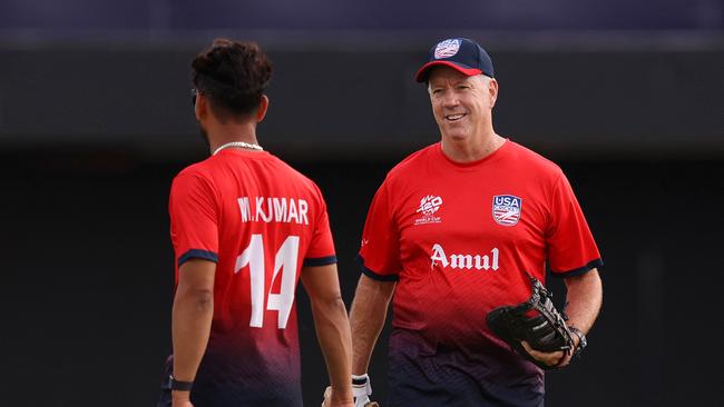 Stuart Law, Head Coach of USA chats with his player Milind Kumar prior to the ICC Men's T20 Cricket World Cup (Photo by ROBERT CIANFLONE / GETTY IMAGES NORTH AMERICA / Getty Images via AFP)