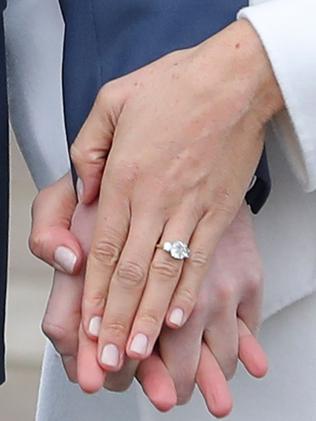 Meghan Markle shows off her engagement ring. Picture: AFP/Daniel Leal-Olivas