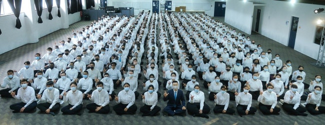 Members of the Melbourne SCJ branch. They're required to sit in rows and can only wear white shirts and black slacks on some occasions.