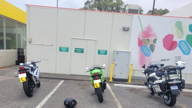 Police escorted the two riders to a service station where they purchased new L-plates. Picture: SAPOL