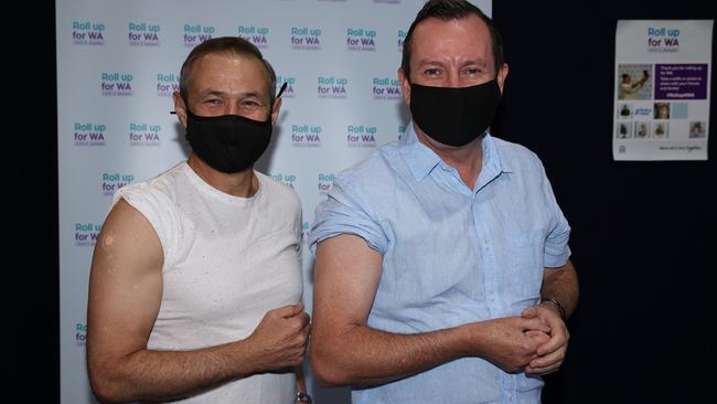 West Australian Health Minister Roger Cook and Premier Mark McGowan pose after receiving their Astra Zeneca COVID-19 vaccine at Claremont Showgrounds on Monday. Picture: Paul Kane/Getty Images