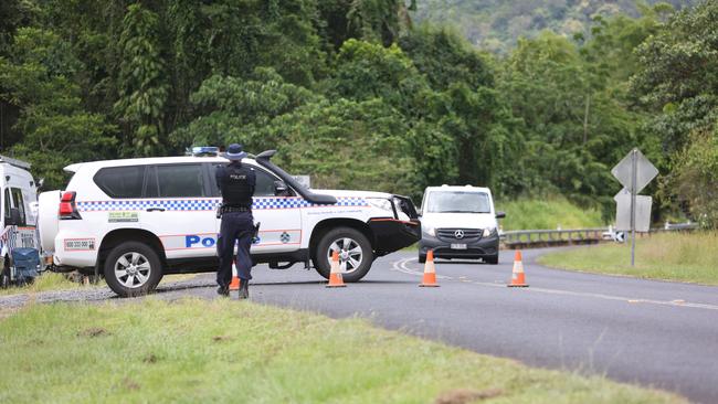 The undertaker's van passes through a police roadblock on The Boulders Rd, Babinda after a 19-year-old Edmonton woman fell at the Babinda Boulders. Picture: Arun Singh Mann