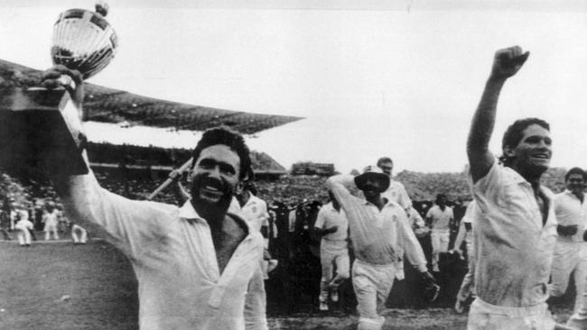 Australian captain Allan Border holds aloft the 1987 World Cup after victory over England at Eden Gardens.