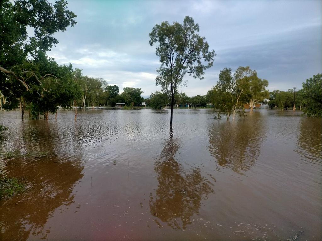 The Waterhouse River has broken its banks, flooding Beswick (Wugularr) in the aftermath to Cyclone Tiffany crossing the coast on Wednesday. Picture: Supplied