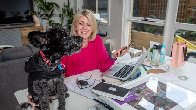 Sarah Purches and her dog Lenny plan remote working in June. Picture: Jake Nowakowski