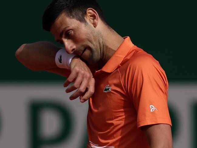 MONTE-CARLO, MONACO - APRIL 12: Novak Djokovic of Serbia reacts against Alejandro Davidovich Fokina of Spain during day three of the Rolex Monte-Carlo Masters at Monte-Carlo Country Club on April 12, 2022 in Monte-Carlo, Monaco. (Photo by Julian Finney/Getty Images)