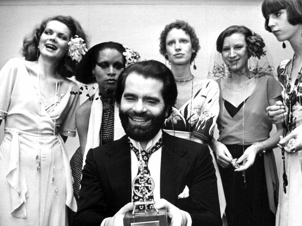 German fashion designer Karl Lagerfeld, left, poses with models in Krefeld, Germany, in 1973.  Picture: AP