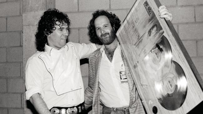 Jimmy Barnes with Michael Gudinski in 1985. Picture: Bob King