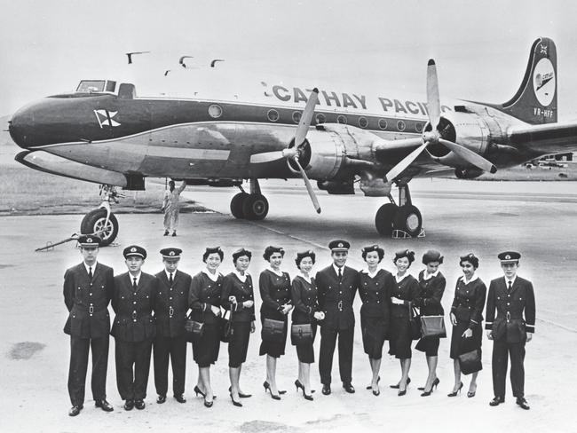 Usage: All media worldwide  Expiry date: Perpetual  Description: Newly graduated Cabin Crew with Douglas DC-4 (VR-HFF), c. 1960