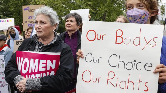 Marchers hold up signs during a Mother's Day rally in support of Abortion rights at the U.S. Supreme Court on May 08, 2022 in Washington, DC. Photo by Jemal Countess/Getty Images for Supermajority