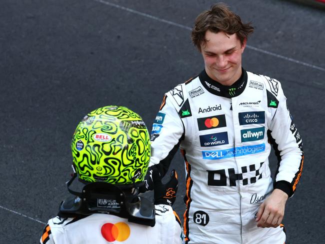 MONTE-CARLO, MONACO - MAY 25: Third placed Oscar Piastri of Australia and McLaren congratulates Race winner Lando Norris of Great Britain and McLaren in parc ferme during the F1 Grand Prix of Monaco at Circuit de Monaco on May 25, 2025 in Monte-Carlo, Monaco. (Photo by Clive Rose/Getty Images)