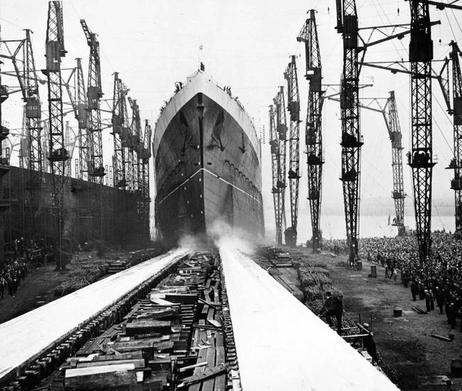 The Cunard ocean liner Queen Elizabeth rolls into the water at its launch September 27, 1938.