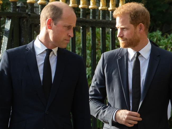 Prince William, the new Prince of Wales, and Prince Harry, the Duke of Sussex, arrive to view floral tributes to Queen Elizabeth II laid outside Cambridge Gate at Windsor Castle on 10th September 2022 in Windsor, United Kingdom. Queen Elizabeth II, the UK's longest-serving monarch, died at Balmoral aged 96 on 8th September 2022 after a reign lasting 70 years. (photo by Mark Kerrison/In Pictures via Getty Images)