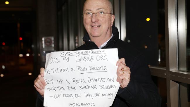 Andrew Burrell outside the owners corporation meeting last month, calling for a royal commission into the construction industry.