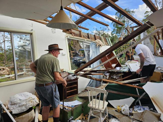 Len Latours inside his destroyed home on Mount Tamborine.