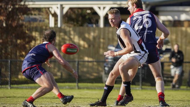 SFNL: Angus Macpherson is first to the ball for Chelsea Heights. Picture: Valeriu Campan