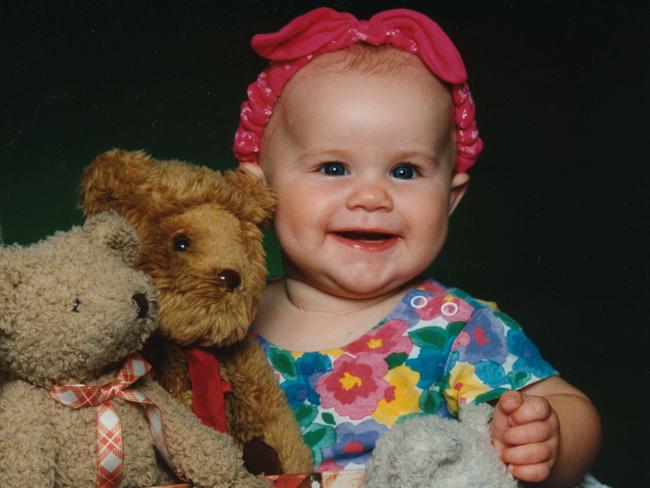 Baby Laura Folbigg with her teddy bears in undated photo, died in 1999 after being smothered by mother Kathleen.