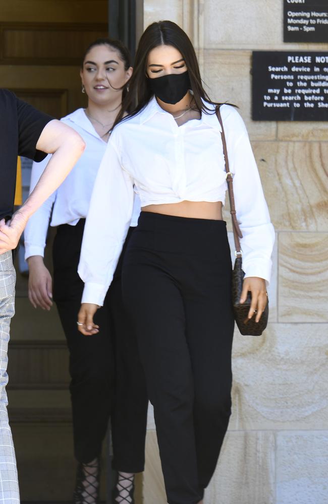 Elise Shrimpton leaves the Adelaide Magistrates Court with a supporter on Wednesday. Picture: NCA NewsWire/Naomi Jellicoe